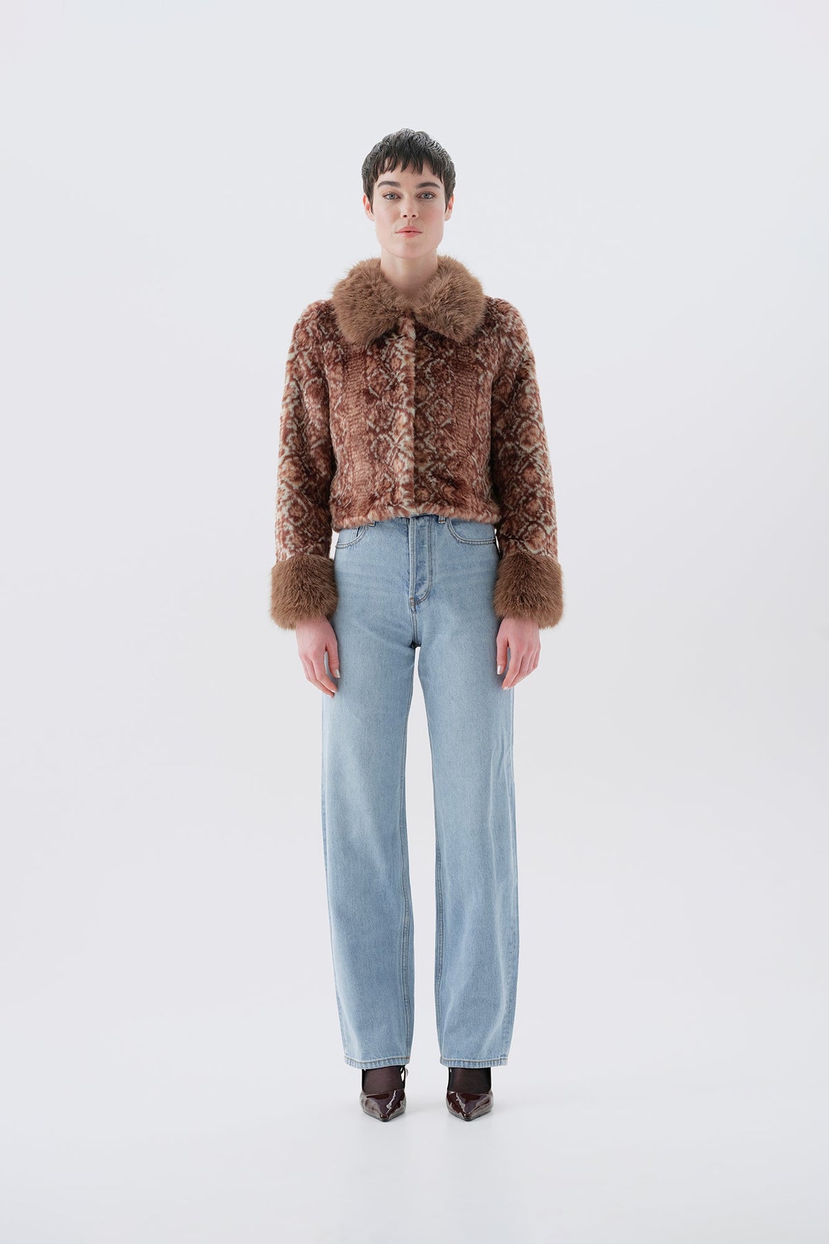 Cropped brown patterned faux fur jacket, fur trim collar and cuffs, front view