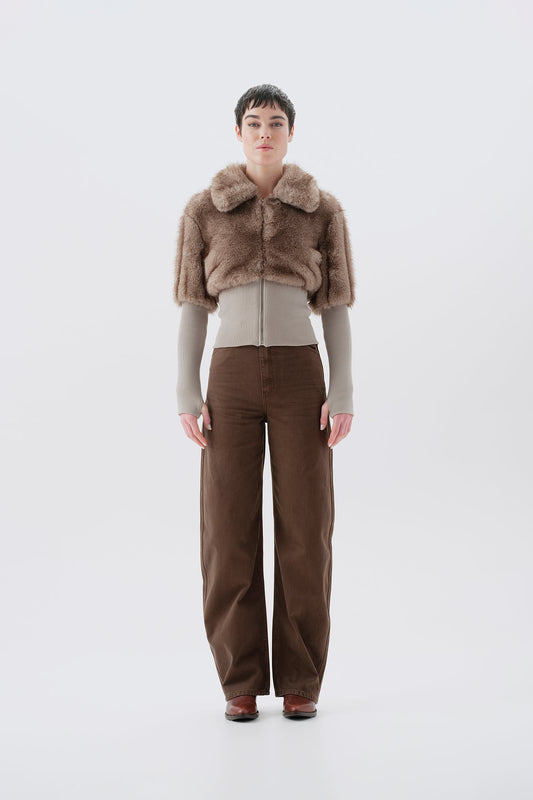Cropped beige and gray faux fur jacket with statement collar and ribbed knit trim at waist and cuffs, front view