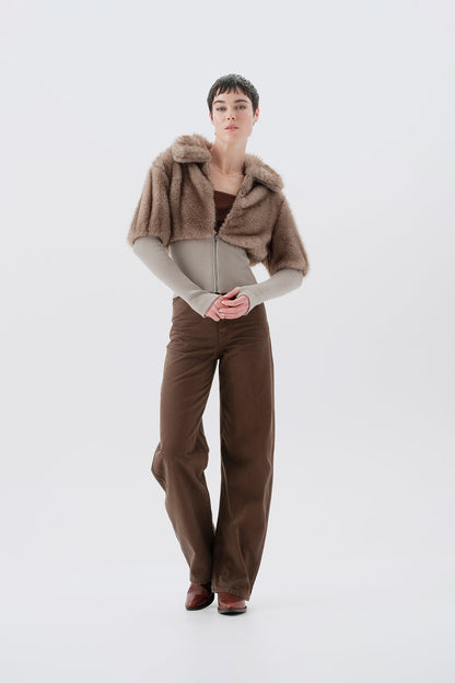 Cropped beige and gray faux fur jacket with statement collar and ribbed knit trim at waist and cuffs
