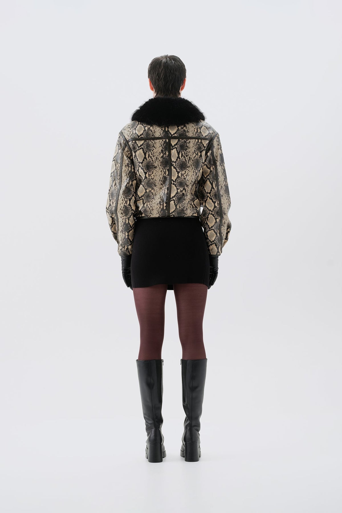 Cropped mock python PU jacket with black faux fur collar, back view