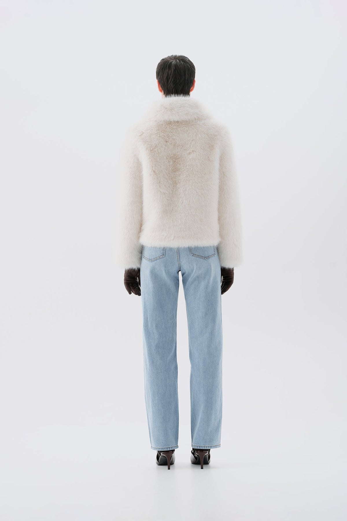 White faux fur jacket, back view
